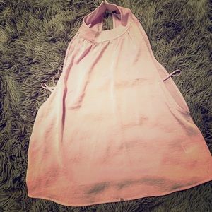 Express tank with side and back cutouts